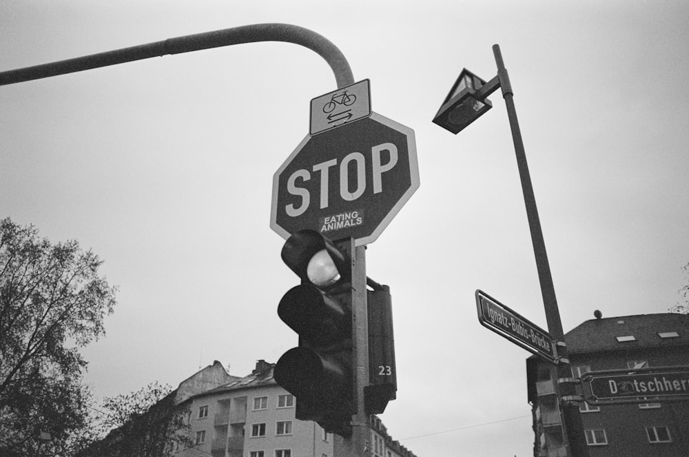 a black and white photo of a stop sign