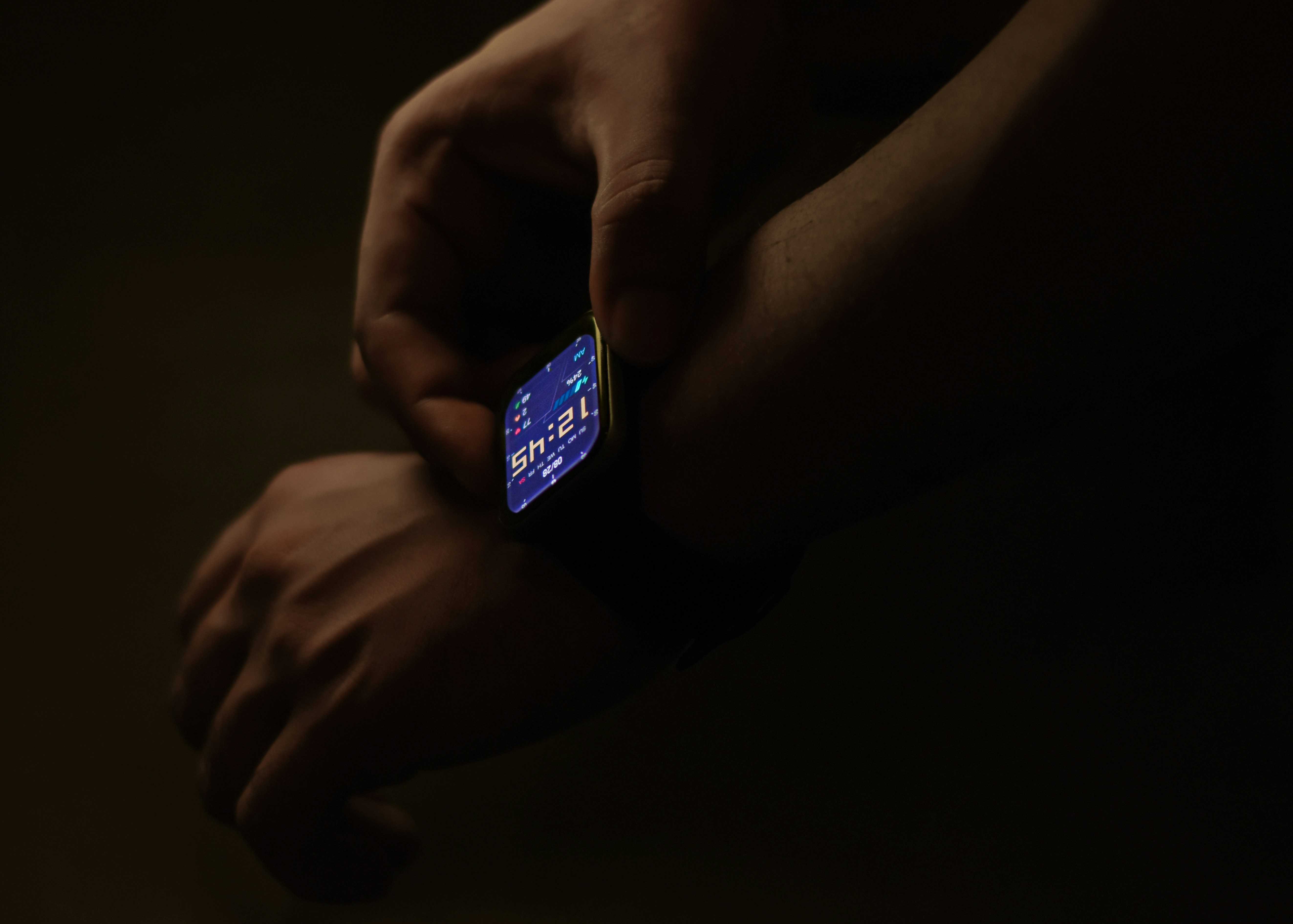 a person holding a smart phone in their hands