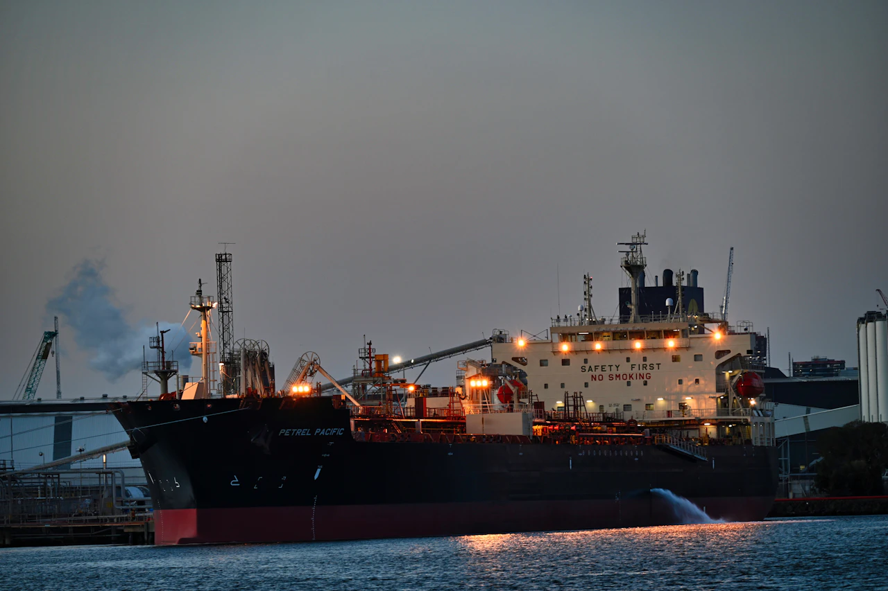 Crude oil tanker in harbor at night