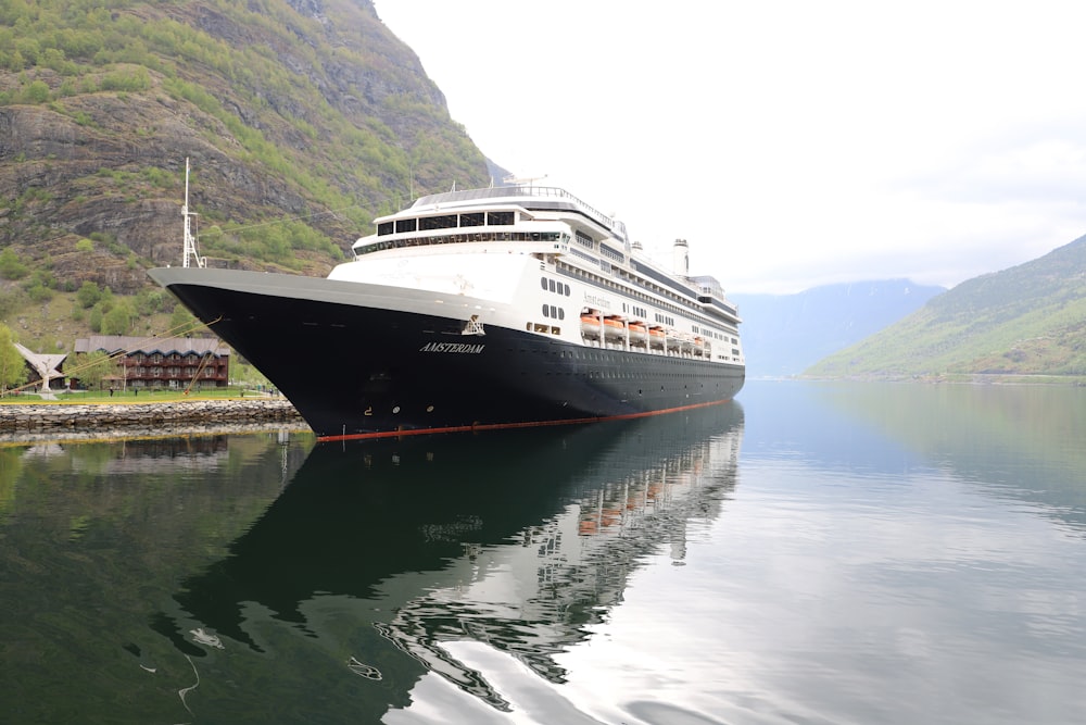 a cruise ship is docked in the water