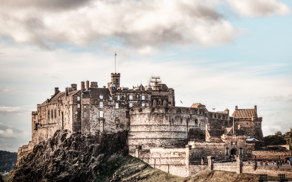 a large castle sitting on top of a hill