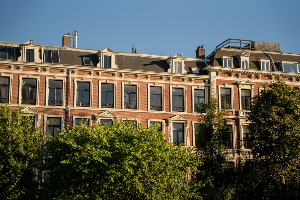 a tall brick building with lots of windows