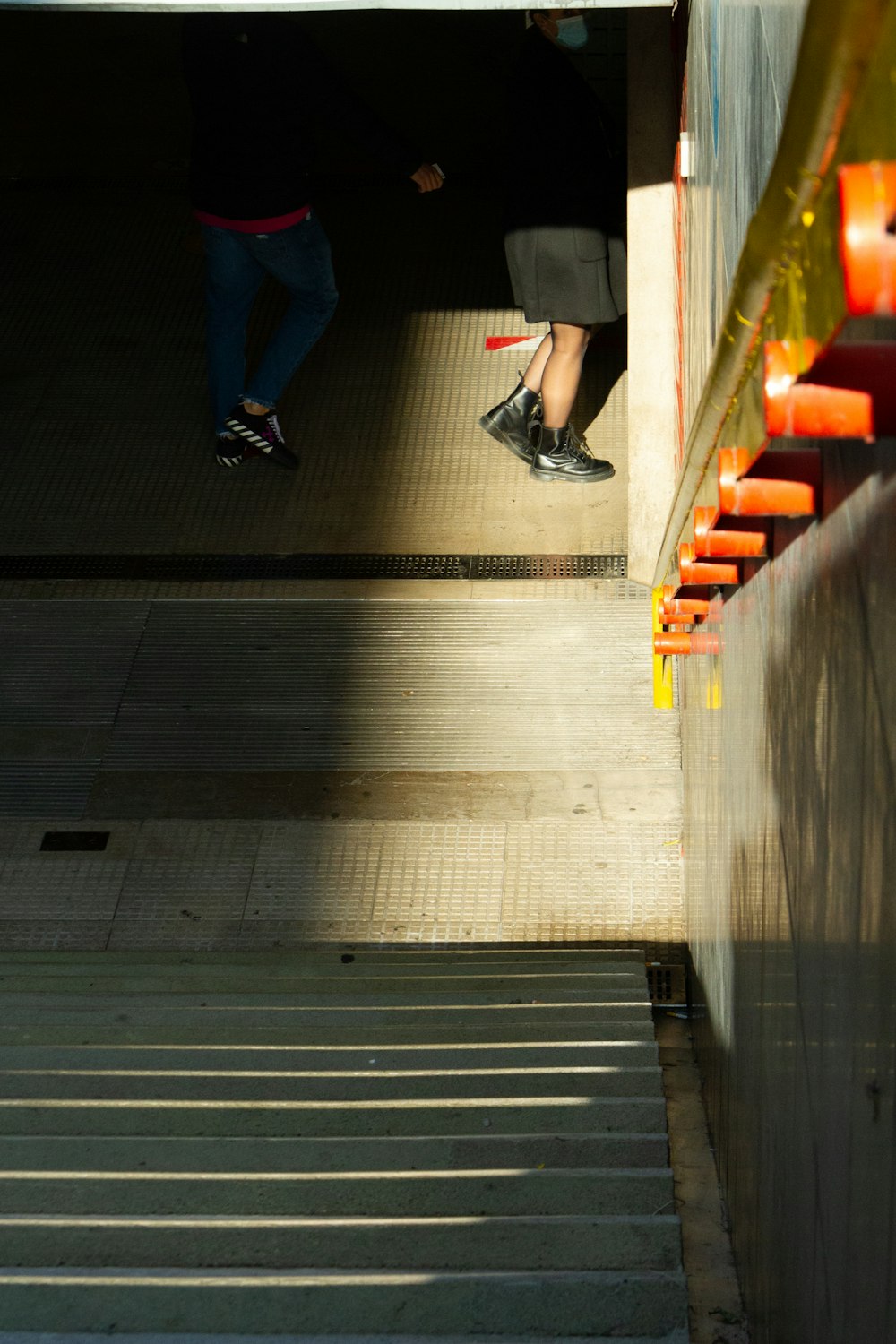 a person walking up a flight of stairs