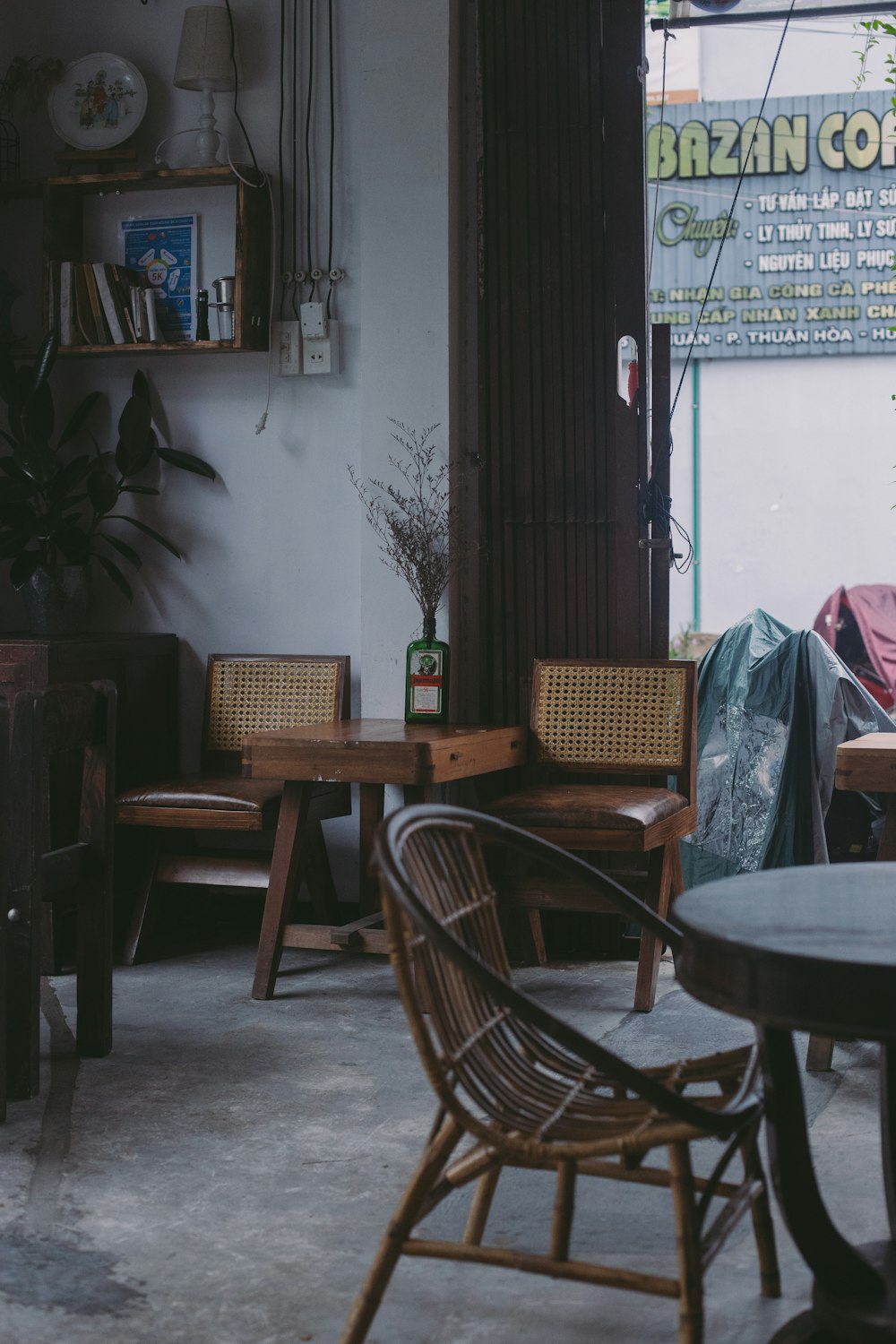 a room filled with lots of furniture and tables