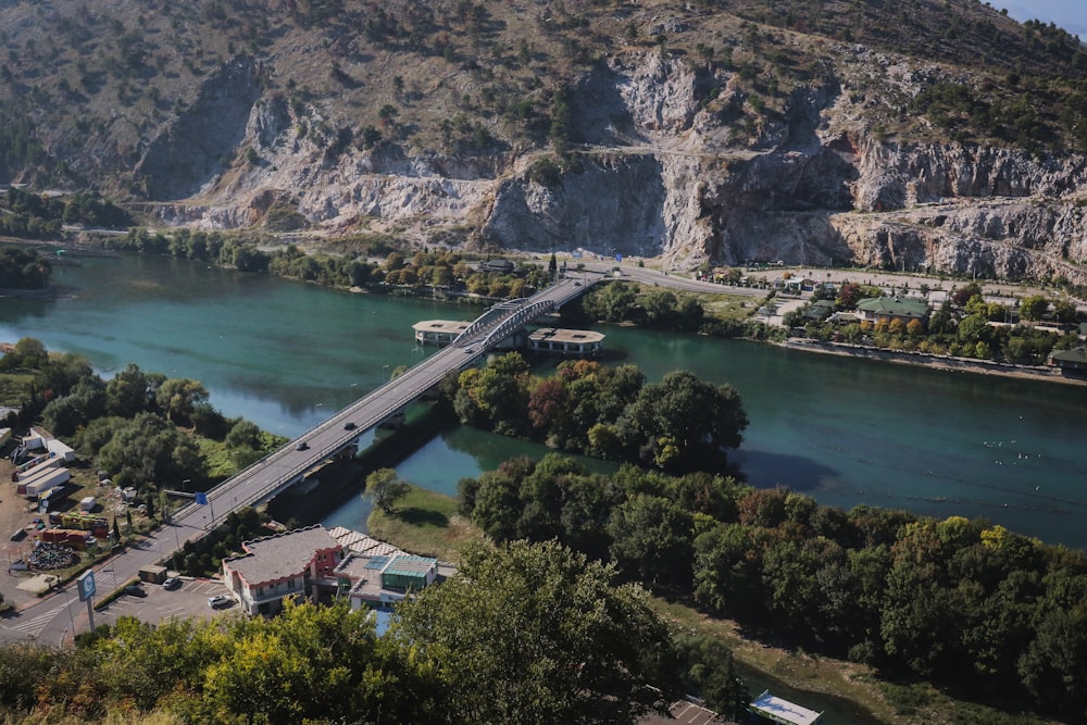 an aerial view of a bridge over a river