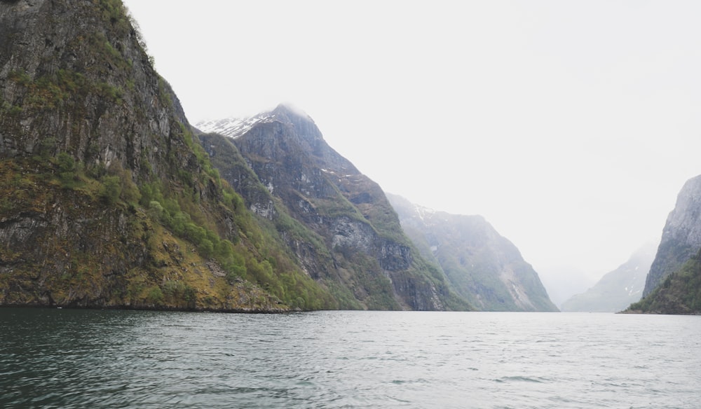 a large body of water surrounded by mountains