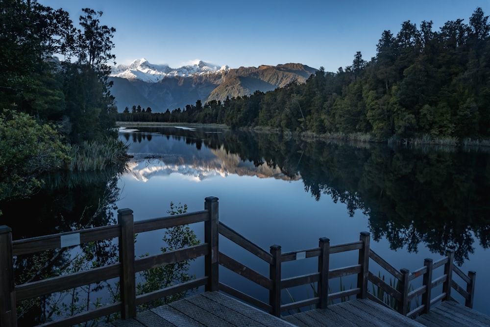 a wooden dock sitting next to a body of water