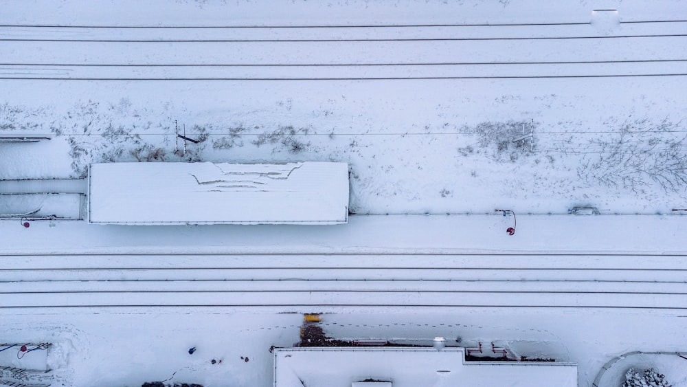 a white building with a lot of snow on top of it