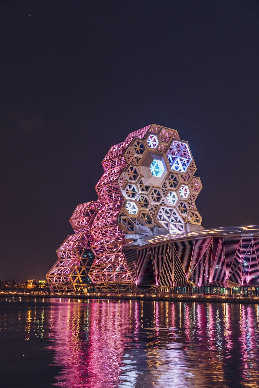 a large building that is lit up at night