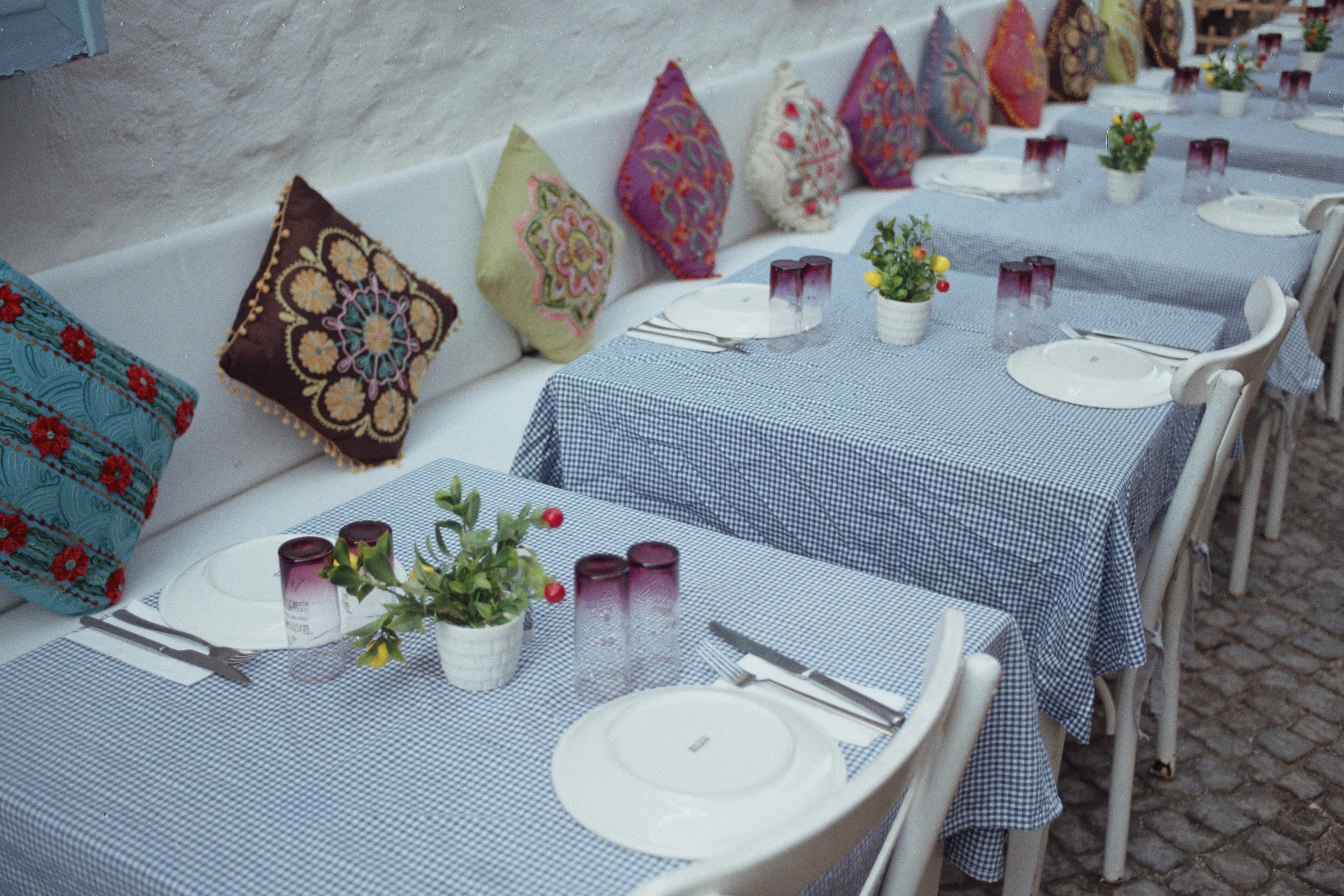 a row of tables sitting next to each other