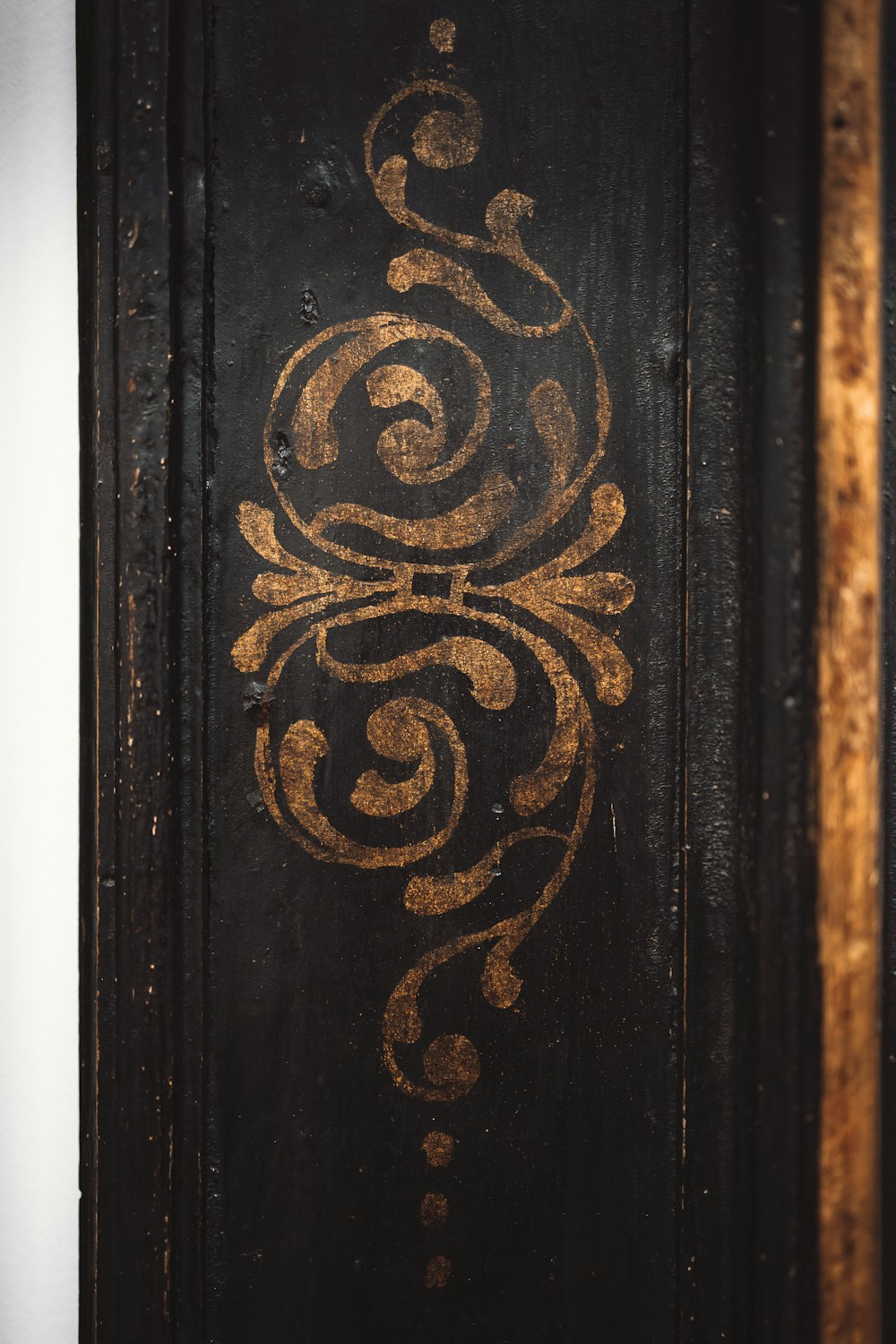 a close up of a door with a design on it