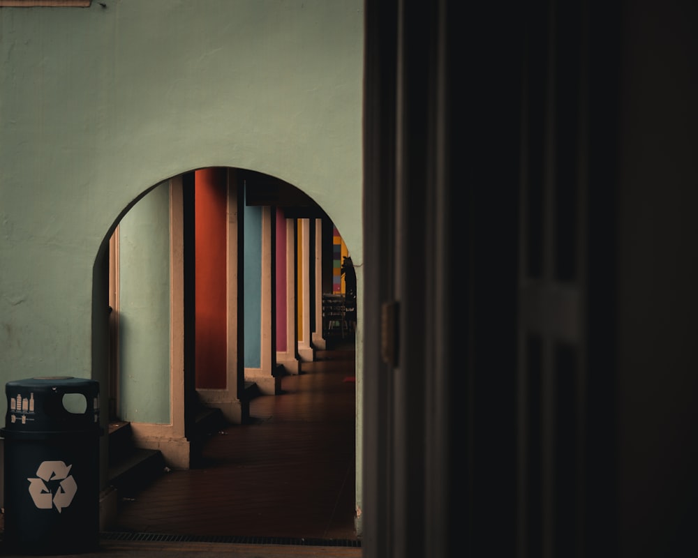 a hallway that has a bunch of different colors on it