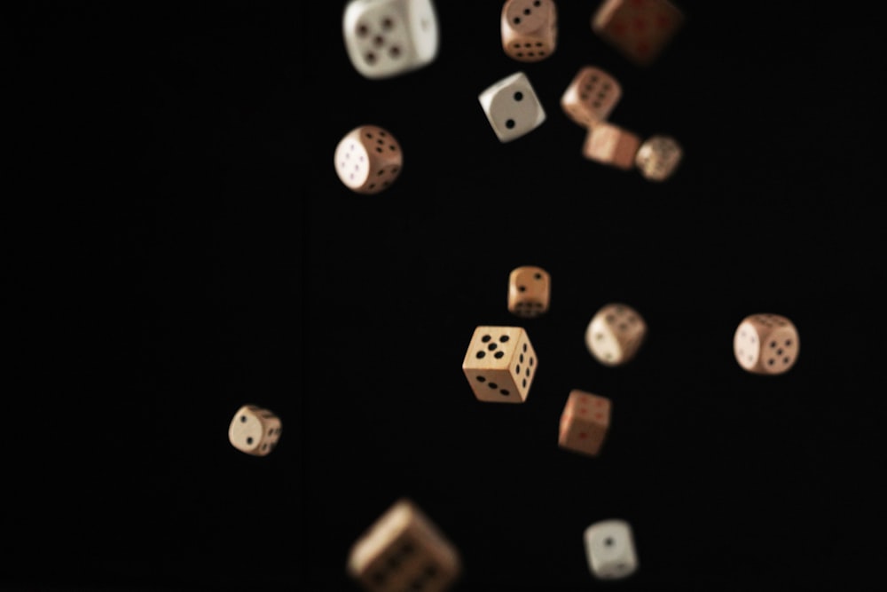 a group of dices flying in the air