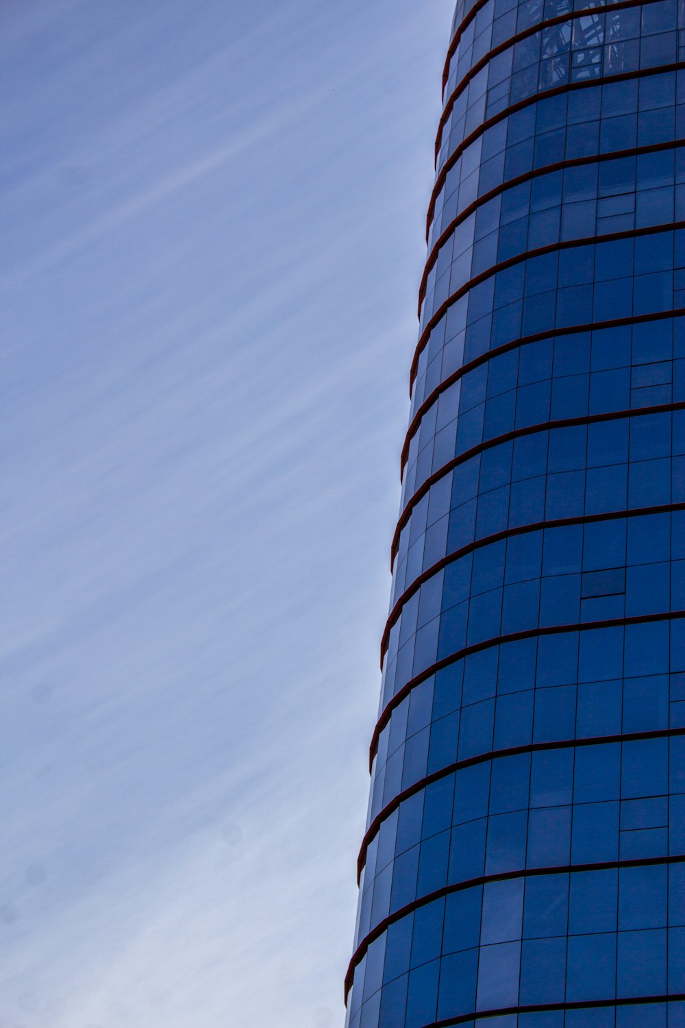 a very tall building with a clock on it's side