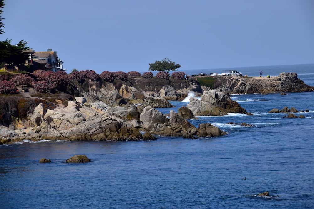 a large body of water surrounded by rocks