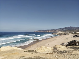 A scenic view of a family vacation at the beach.