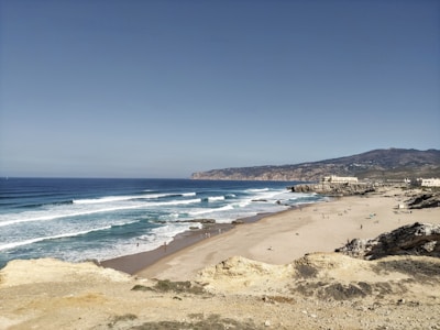 A scenic view of a family vacation at the beach.