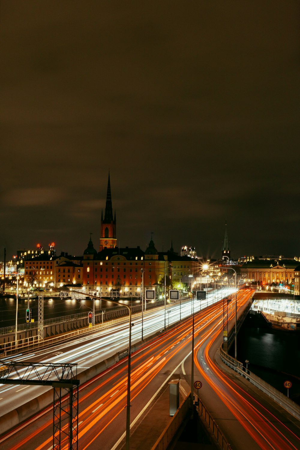 a night time view of a city with traffic