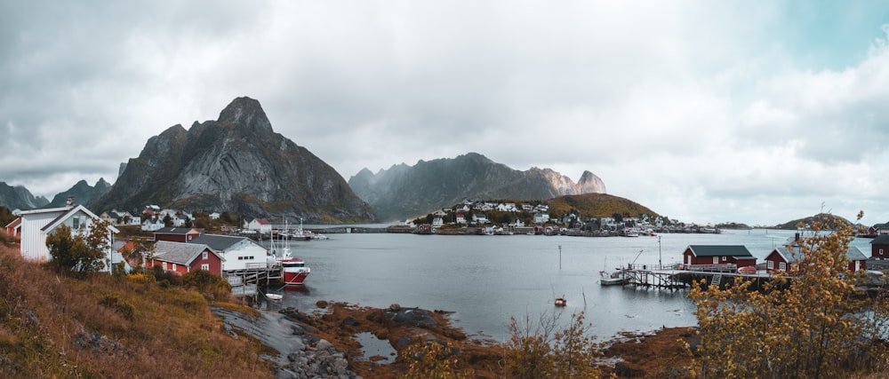 a view of a harbor with a mountain in the background