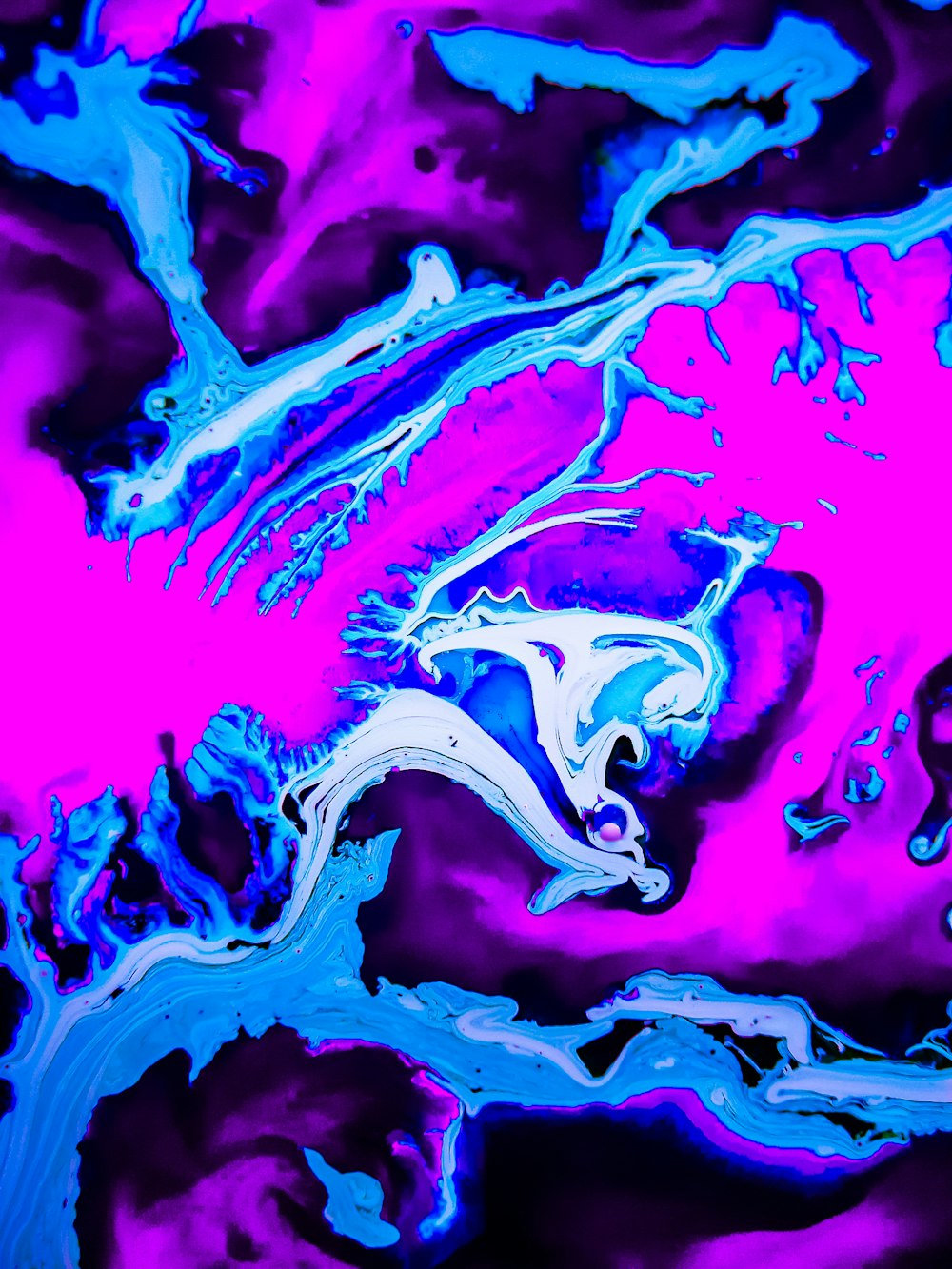 an abstract painting with blue and pink colors