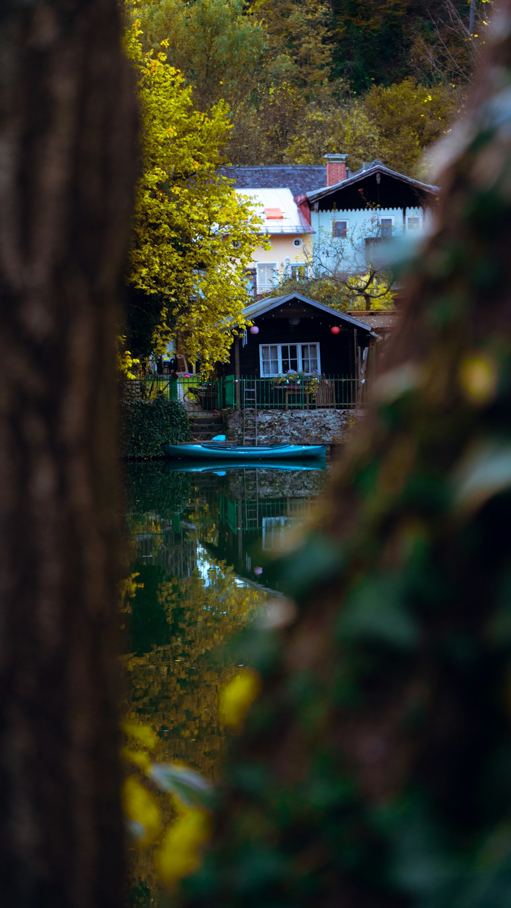 a house on the shore of a lake
