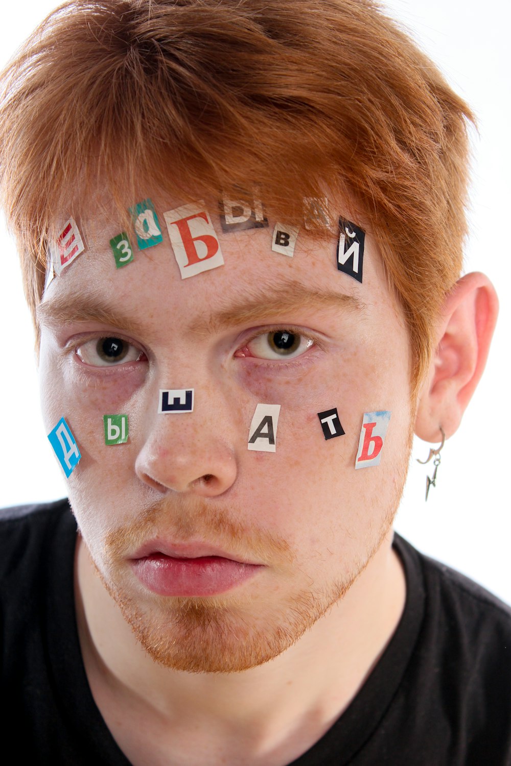 a man with letters painted on his face