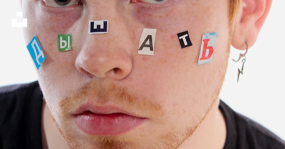 A man with letters painted on his face photo – Free Saint petersburg ...