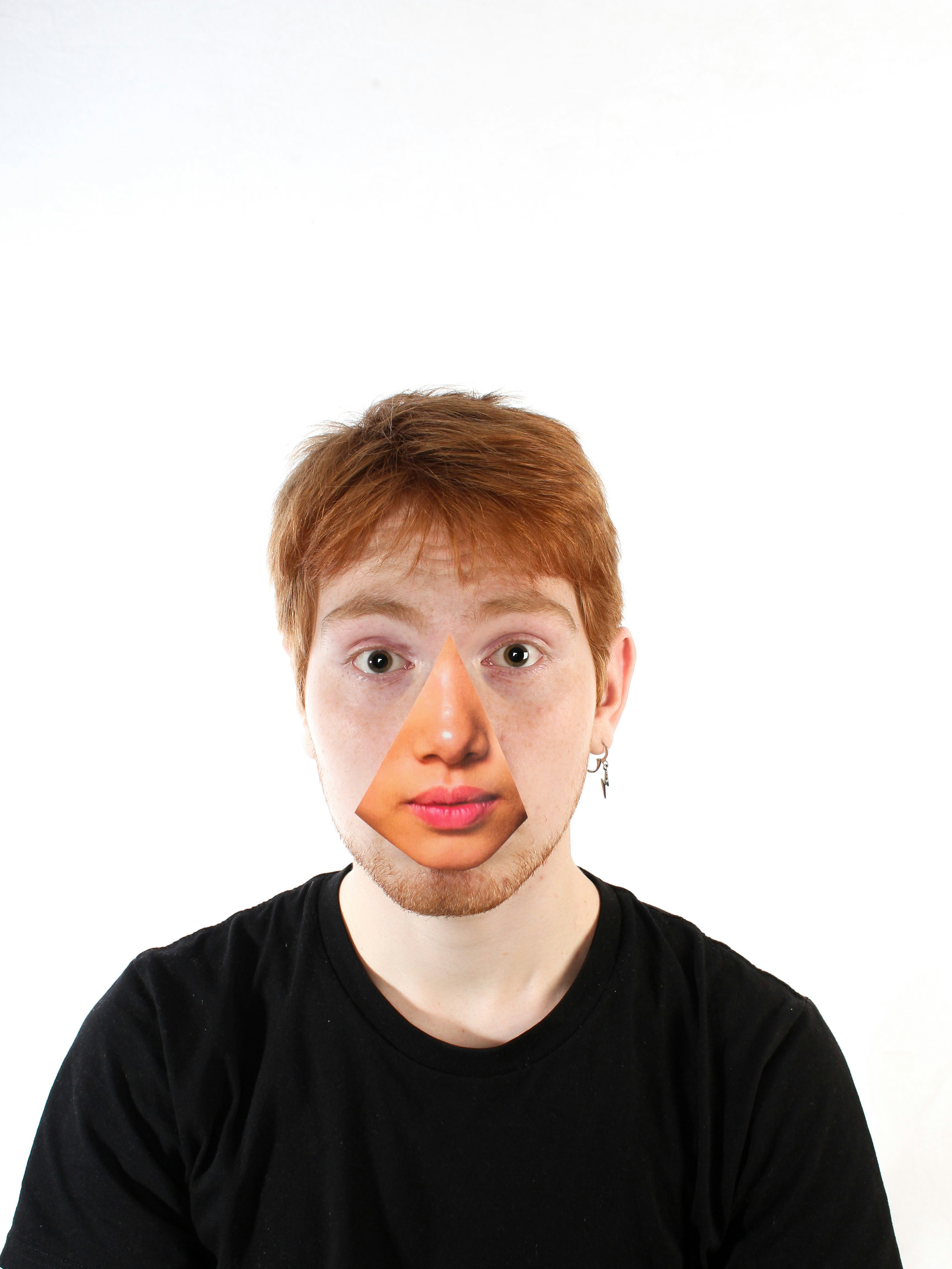 a man with a piece of paper on his face