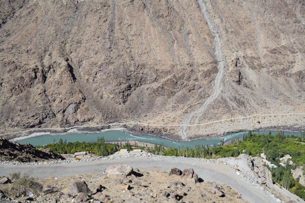 a view of a mountain with a lake in the middle of it