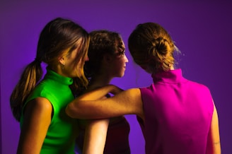a group of women standing next to each other