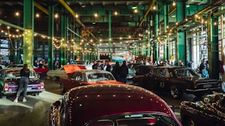 a group of cars parked inside of a building