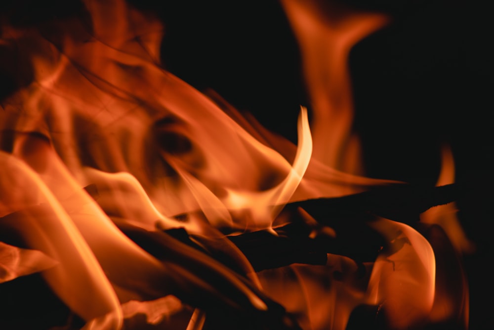 a close up of a fire in the dark