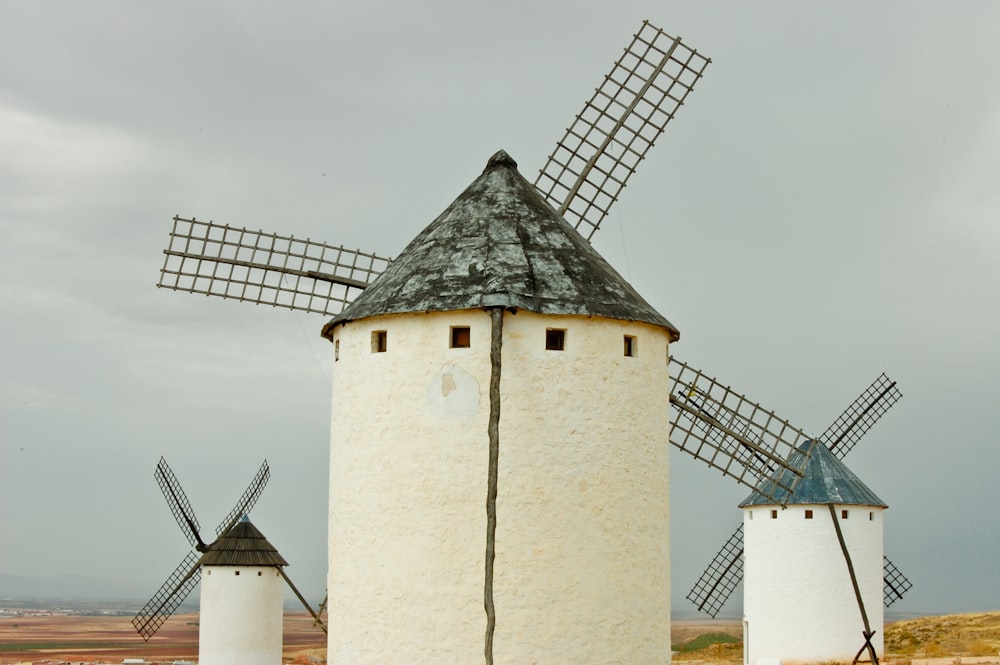 a couple of windmills sitting next to each other