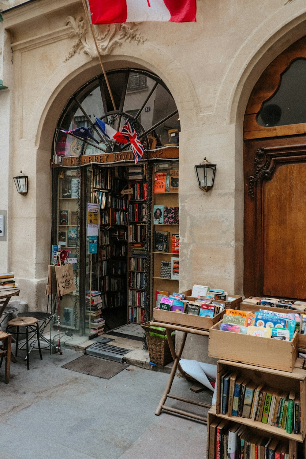 a book store with a flag flying outside of it