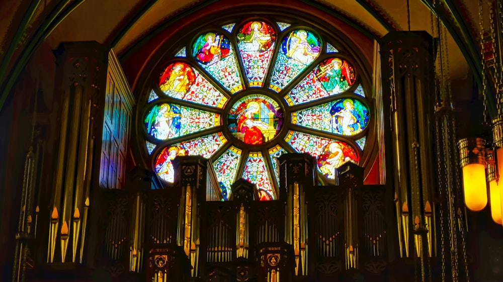 a stained glass window inside of a church