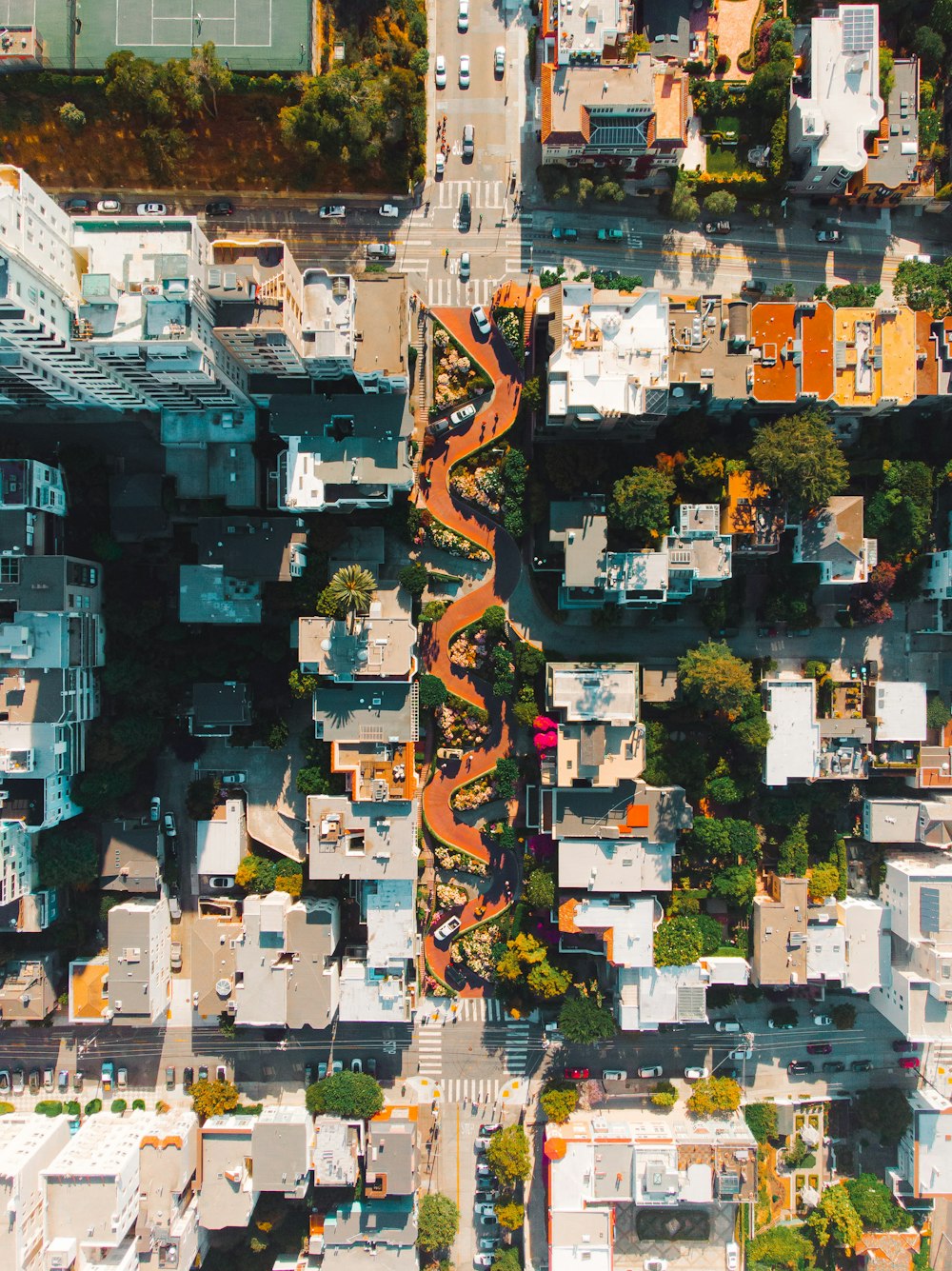 an aerial view of a city with lots of buildings