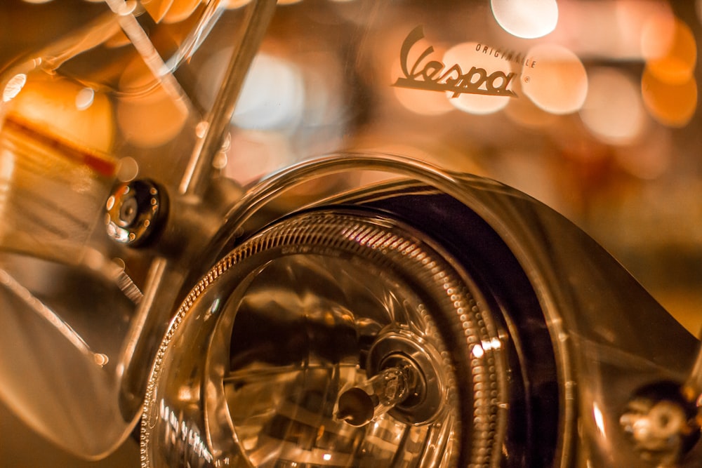a close up of a motorcycle with a blurry background