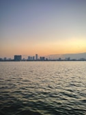 A serene view of Jakarta's skyline at sunset.