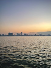 A serene view of Charlotte's skyline during sunset.