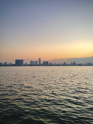 A serene view of Jakarta's skyline at sunset.