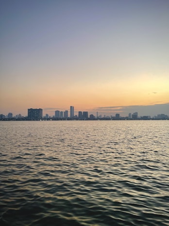 A serene view of Mumbai's skyline at sunset.