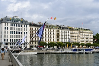 a body of water with a bunch of buildings in the background