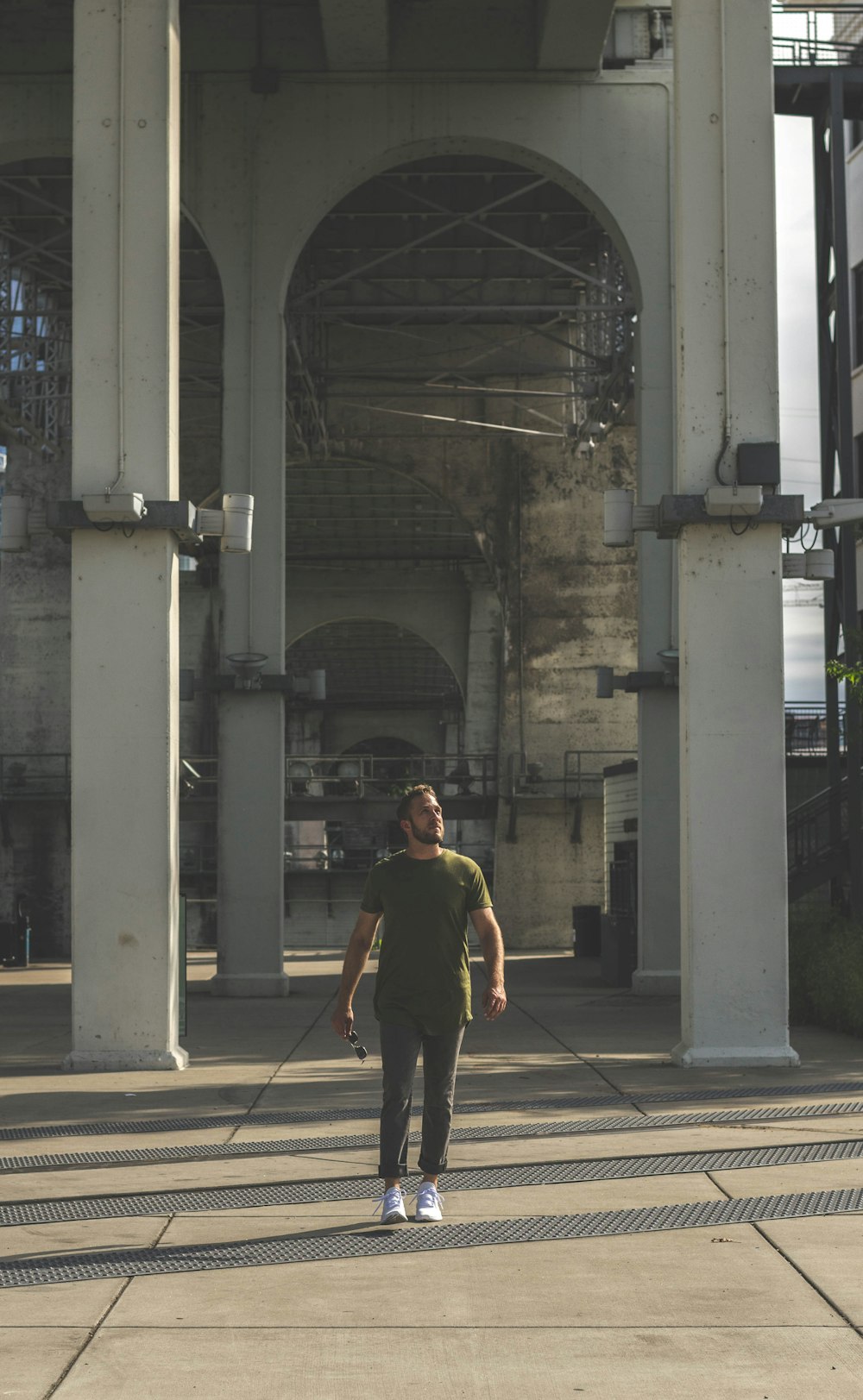 a man standing in front of a train station