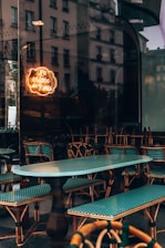 a table and chairs outside of a restaurant