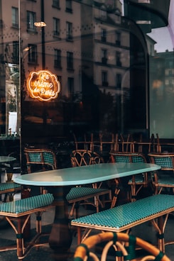 a table and chairs outside of a restaurant