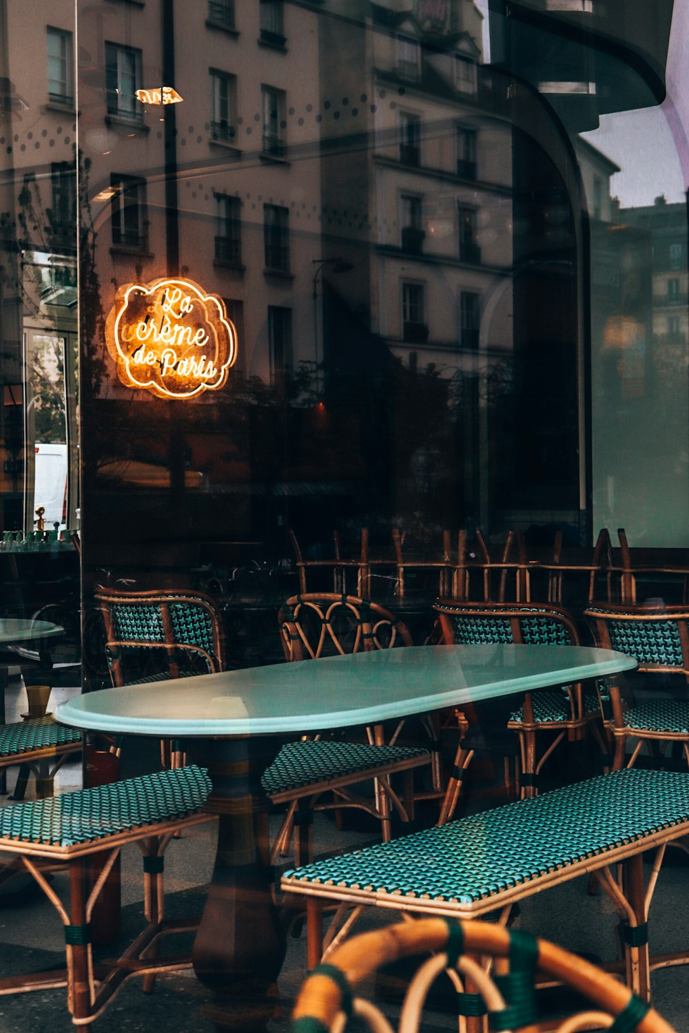 a table and chairs outside of a restaurant