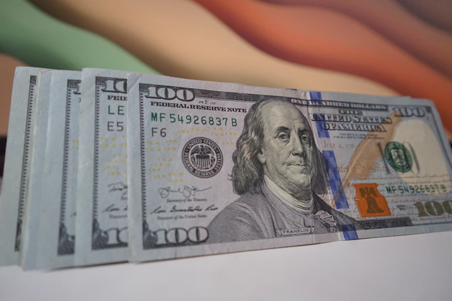 A stack of twenty dollar bills