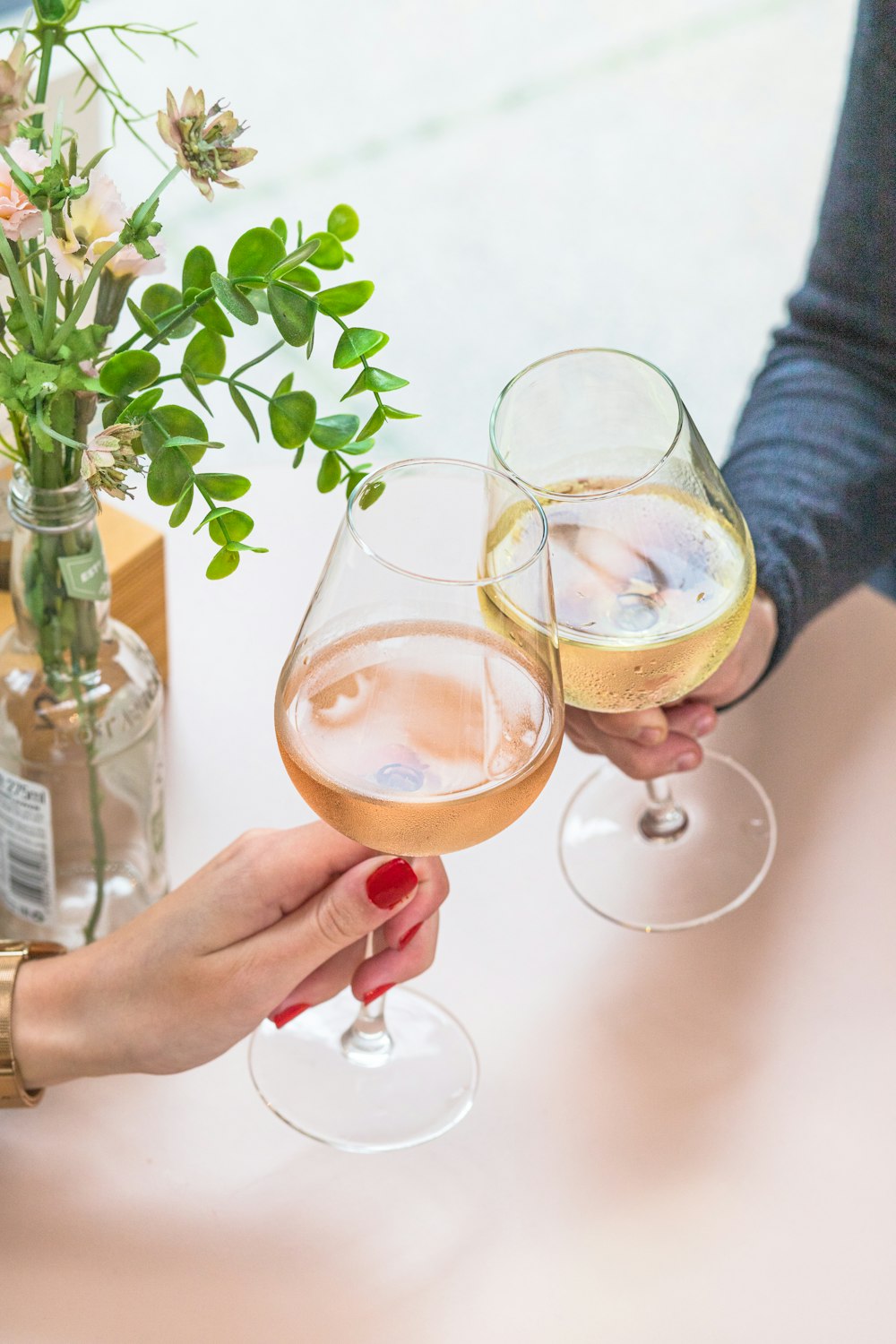 a person holding a wine glass