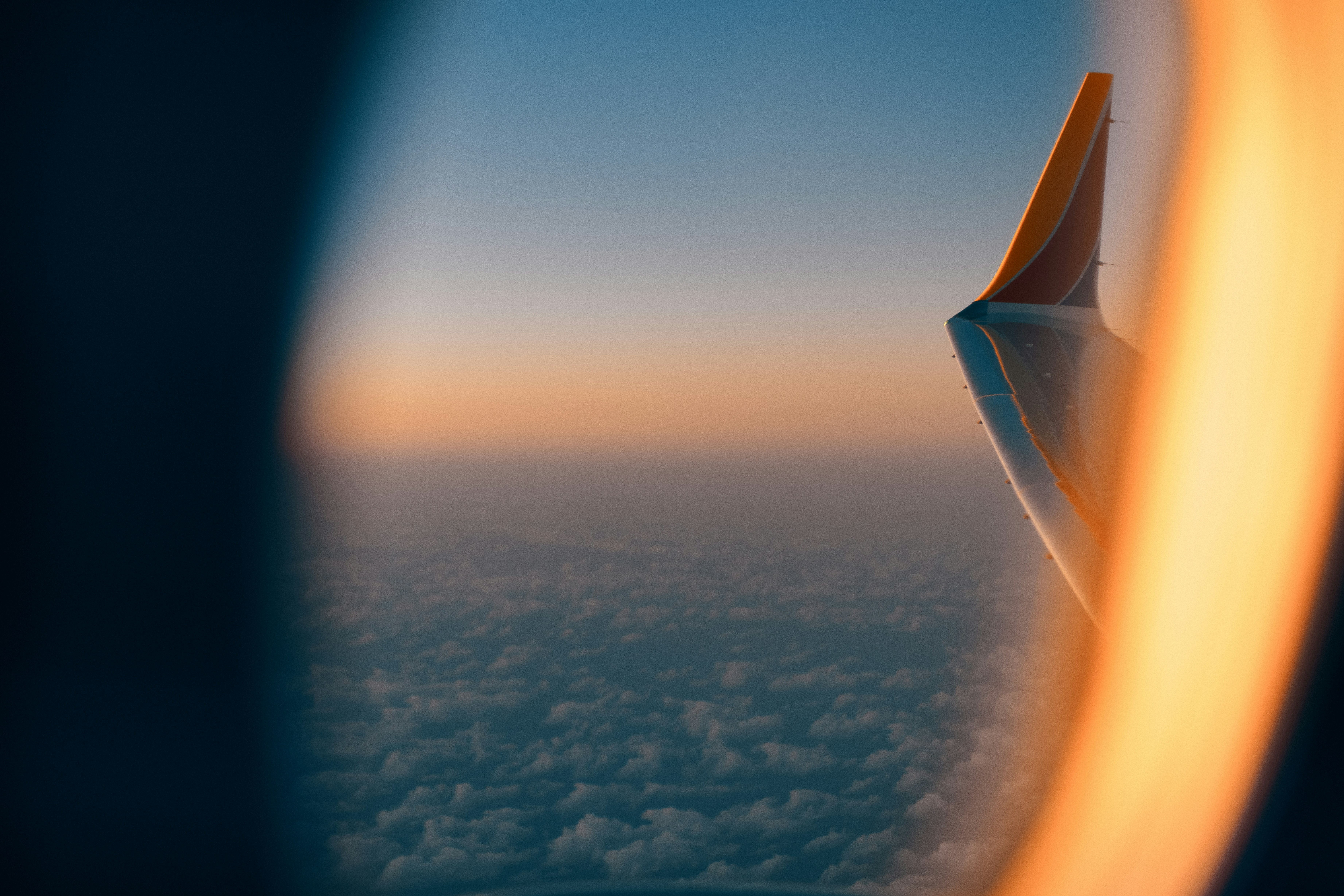 a view of the wing of an airplane in the sky, Southwest 737 MAX 8