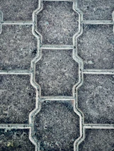 Close-up of decorative stonework and paver patio completed with expert craftsmanship.